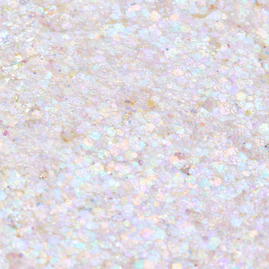 Disco Lady Glitter Gel shimmering in a close-up swatch, iridescent opal hex and micro glitter suspended in clear gel reflecting pastel rainbow hues; macro texture for ColourPop Glitter Gel product photography.