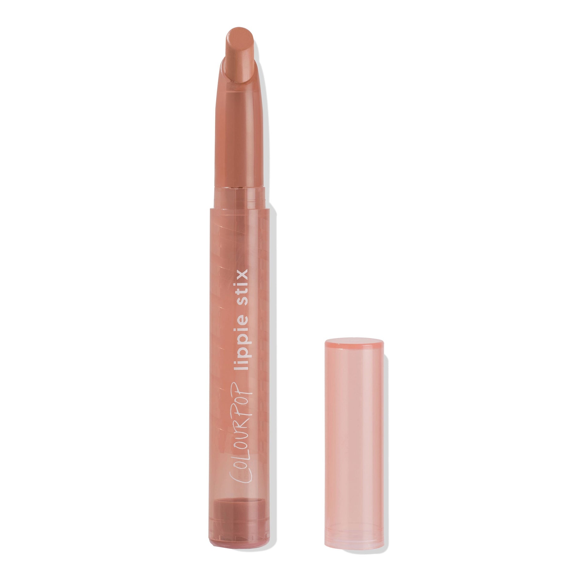 ColourPop Lippie Stix Dream Date, a warm nude-beige lipstick, shown twisted up in a slim peach tube with white “lippie stix” lettering, cap set beside it on a clean white background.