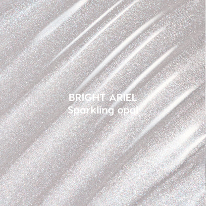 Bright Ariel Ultra Glossy Lip swatch showing shimmering sparkling opal gloss in wavy strokes against a light background, highlighting high-shine Disney Princess inspired lip color texture for US makeup lovers.