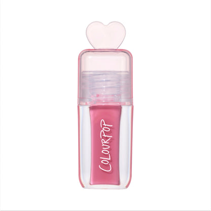 ColourPop Your New Obsession ultra glossy lip in the Heart to Get shade standing upright on a white background, featuring a clear pink tube with bold white logo and a translucent heart-shaped cap for a cute, high-shine lip gloss look.