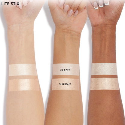 Glazey Lite Stix swatches glow across three forearms, with two stripes per arm - Glazey on top, Sunlight below - showing the ColourPop Lite Stix pearly highlight on light, medium, and deep skin tones against a white background.