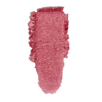 Roy G. Biv ColourPop Super Shock Shadow swatched in a single thick swipe, showing a metallic rose‑pink shimmer with fine sparkle and creamy texture on a white background.